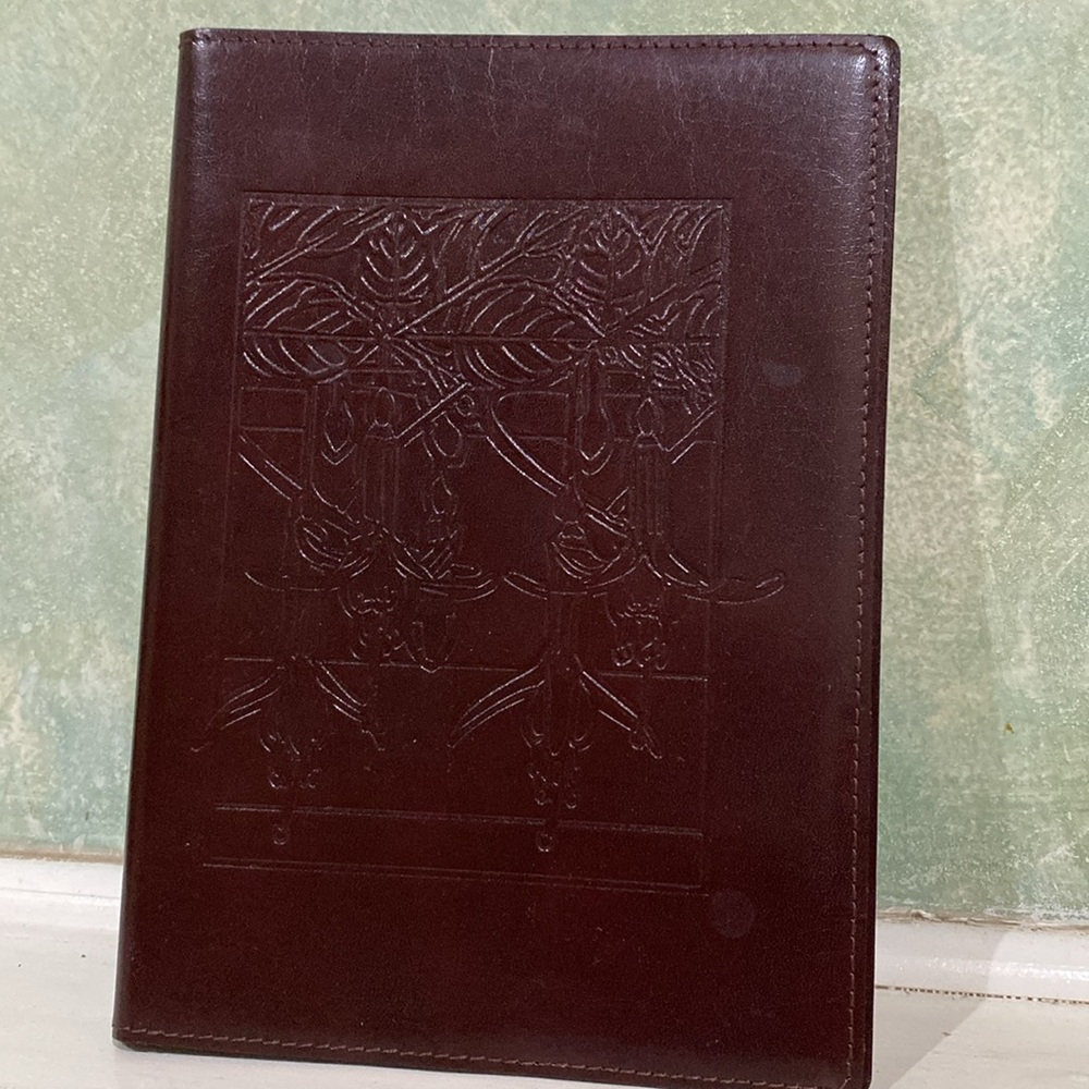 Beautiful journal with embossed leather cover, new, unused condition.